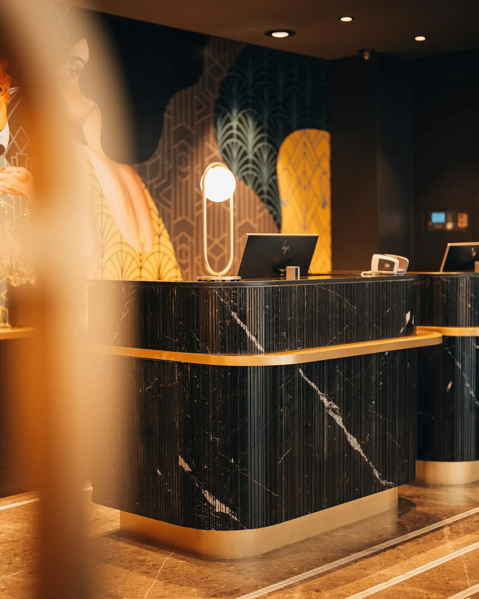 A marble front desk at a wellness business